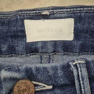 MOTHER      THE LOOKER